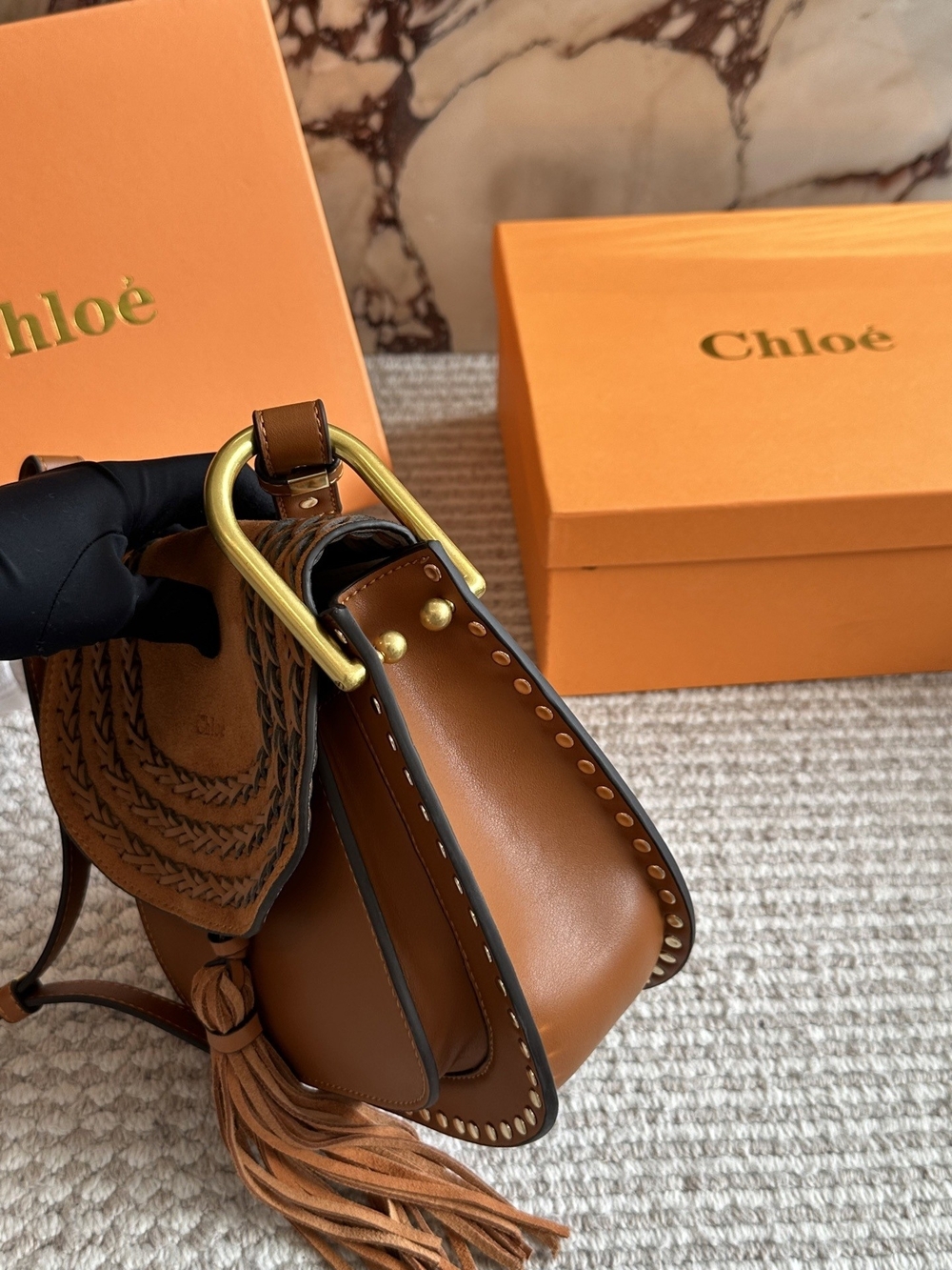 ChloĂŠ Small Brown Leather Saddle Bag with Tassel